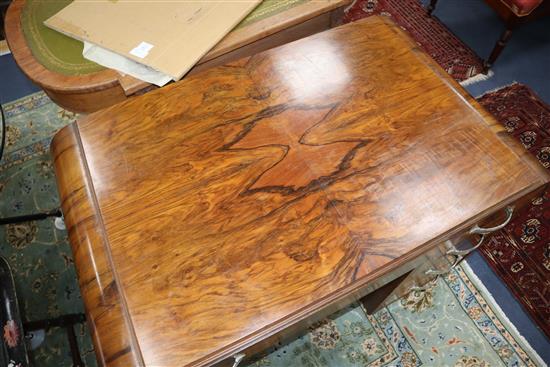 An Art Deco figured walnut desk W.109cm